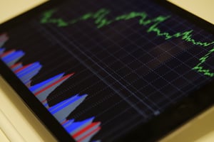 a close up of a screen with colorful unreadable statistics