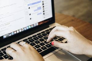 Typing on laptop